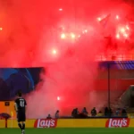 Lens fans banned from Anfield for Champions League clash after flares chaos
