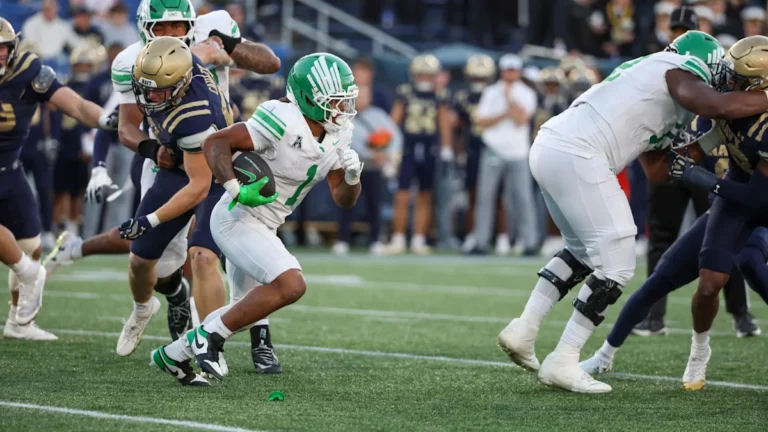 North Texas Star Offensive Trio Powers 49-39 Win at Navy